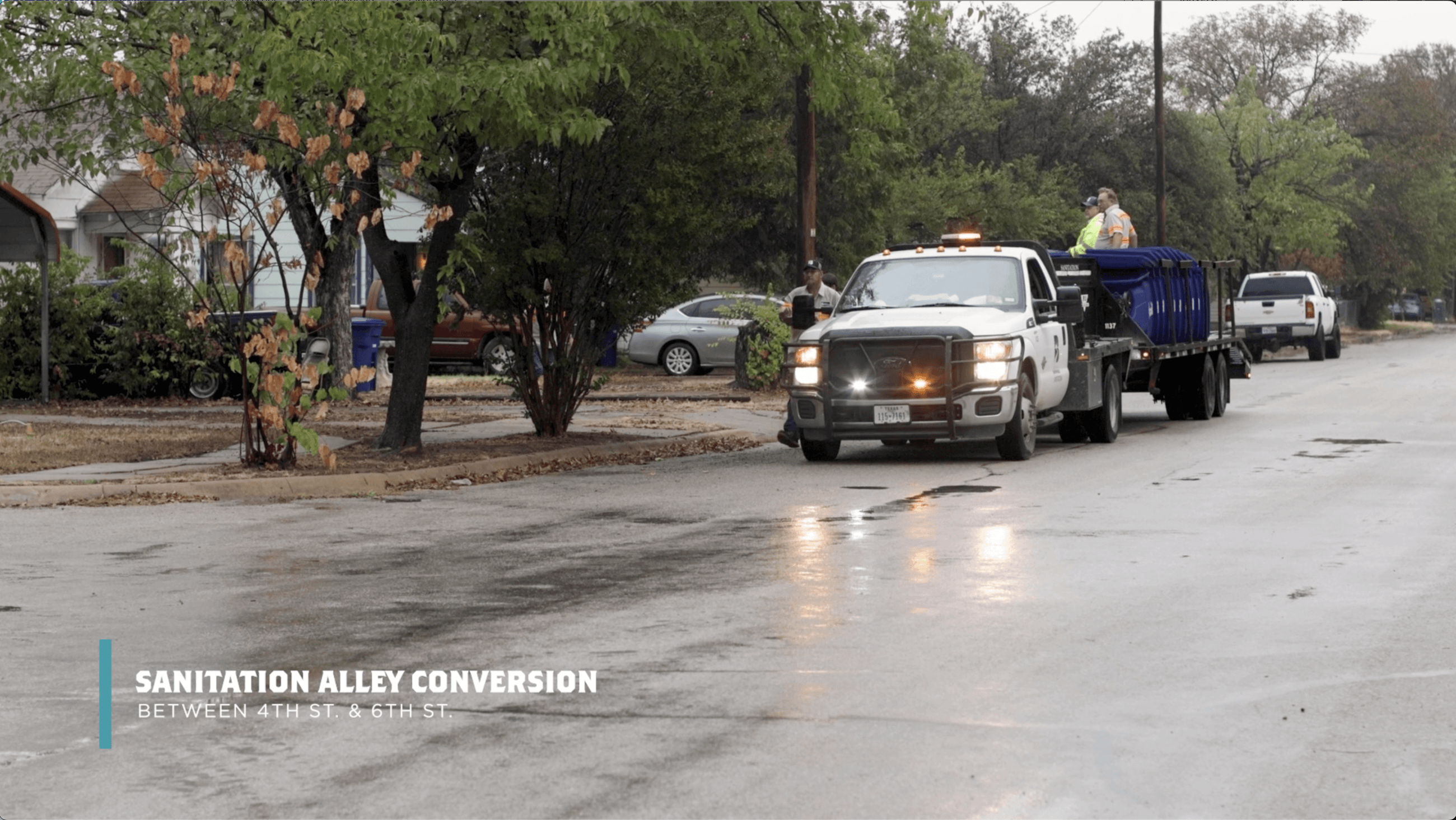 Sanitation brining new rollout collection bins to residents on the blocks of 4th and 6th street